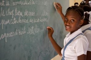 Girl at chalkboard